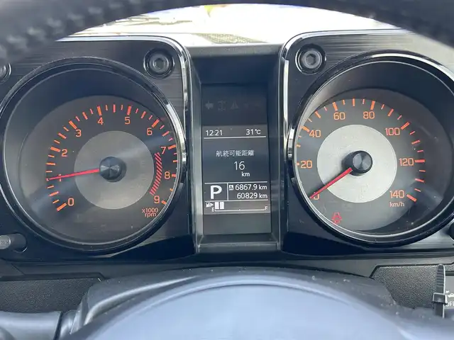 スズキ ジムニー XC 岡山県 2019(令1)年 6.1万km ジャングルグリーン 登録時走行距離60829km/社外ナビ/フルセグTV/(AM.FM.TV.CD.DVD.BT)/バックカメラ/ETC/衝突軽減ブレーキ/ドライブレコーダー/レーンキープアシスト/クルーズコントロール/横滑り防止装置/オートマチックハイビーム/アイドリングストップ/カーテンエアバック/シートヒーター(D+N席)/16インチ純正AW/プッシュスタート/ルーフレール