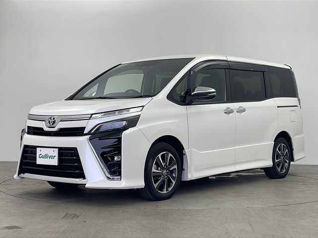 トヨタ ヴォクシー ZS 煌Ⅲ 鹿児島県 2020(令2)年 5.2万km ホワイトパールクリスタルシャイン 純正9インチナビ/（CD/DVD/BT/HDMI/フルセグTV）/純正12.1インチフリップダウンモニター/プリクラッシュセーフティ/レーンキープアシスト/クルーズコントロール/両側パワースライドドア/オートライト/オートマチックハイビーム/アイドリングストップ/LEDヘッドライト/ウォークスルー/スマートキー/プッシュスタート/取説、保証書