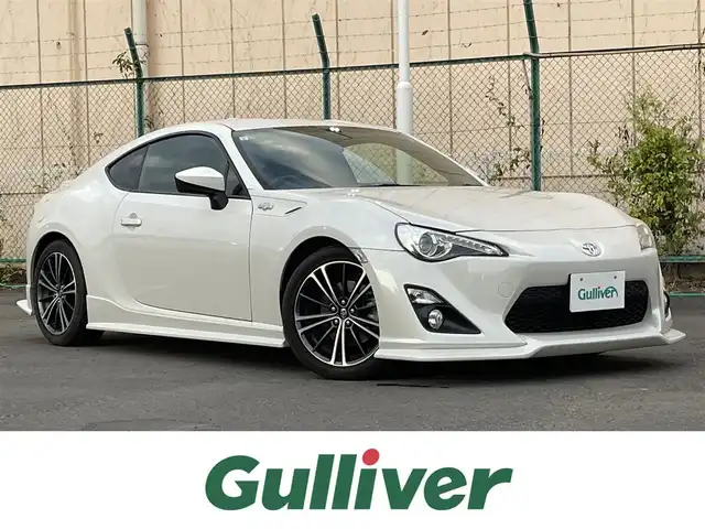 トヨタ ８６ GT 東京都 2013(平25)年 5.4万km サテンホワイトパール 純正ナビ　/フルエアロ　/社外マフラー　/パドルシフト　/革巻きステアリング　/デュアルエアコン　/VSCスポーツモード切替スイッチ　/６AT