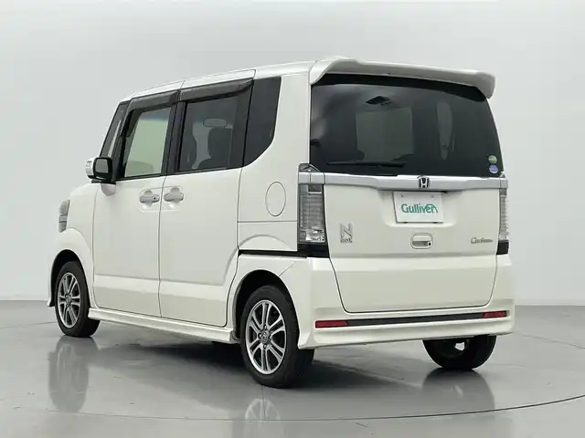 ホンダ Ｎ ＢＯＸ カスタム G Lパッケージ 熊本県 2015(平27)年 5.5万km プレミアムホワイトパールⅡ 社外ナビAVN-Z04i（ＣＤ・ＤＶＤ・フルセグ・ＢＴ・ＳＤ）/片側パワースライドドア　/横滑り防止　/アイドリングストップ　/電動格納ミラー/社外フロアマット　/純正１４インチＡＷ　/オートライト　/ＨＩＤライト　/フォグランプ/スマートキー　/プッシュスタート