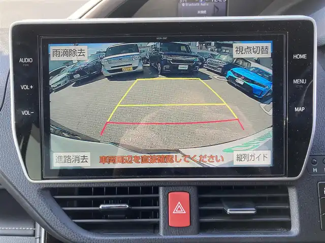 トヨタ エスクァイア ハイブリッド Gi プレミアムパッケージ ブラックテーラード 福岡県 2021(令3)年 8.4万km ホワイトパールクリスタルシャイン ワンオーナー/純正ディーラーナビ（NSZT-Z68T）/（AM/FM//CD/DVD/BT/フルセグTV）/モデリスタエアロ/クルーズコントロール/バックカメラ/フリップダウンモニター/前方ドライブレコーダー/ステアリングヒーター/クリアランスソナー/ビルトインETC/USB入力端子/ウォークスルー/LEDヘッドライト/オートマチックハイビーム/先行車発進告知/レーンキープアシスト/衝突被害軽減システム/純正15インチアルミホイール/純正フロアマット/スペアキー/取扱説明書/保証書