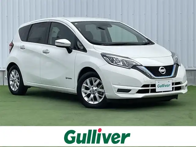 日産 ノート e－パワー X 香川県 2020(令2)年 6万km ホワイト 登録時走行距離：59731km/ケンウッド製ナビゲーション【MDV-D207】/【AM/FM/CD/iPod】/インテリジェントエマージェンシーブレーキ/バックカメラ/クリアランスソナー（前後）/踏み間違い衝突防止アシスト/LDW（車線逸脱警報）/オートヘッドライト/レベライザー/純正15インチアルミホイール/フロアマット/スペアキー/スマートキー/プッシュスタート