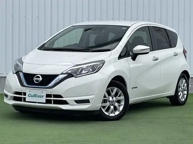 日産 ノート e－パワー X 香川県 2020(令2)年 6万km ホワイト 登録時走行距離：59731km/ケンウッド製ナビゲーション【MDV-D207】/【AM/FM/CD/iPod】/インテリジェントエマージェンシーブレーキ/バックカメラ/クリアランスソナー（前後）/踏み間違い衝突防止アシスト/LDW（車線逸脱警報）/オートヘッドライト/レベライザー/純正15インチアルミホイール/フロアマット/スペアキー/スマートキー/プッシュスタート