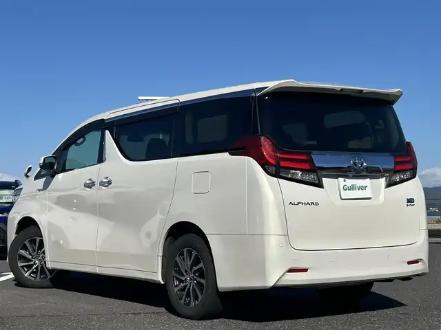 トヨタ アルファードハイブリット X 島根県 2015(平27)年 10.8万km ラグジュアリーホワイトパールクリスタルシャインガラスフレーク 登録時走行距離107901km/ワンオーナー/アルパイン10インチSD純正ナビ/アルパイン12.8インチフリップダウンモニター/フルセグTV/横滑り防止装置/衝突被害軽減ブレーキ/バックカメラ/クリアランスソナー/インテリジェントクリアランスソナー/両側パワースライドドア/レーダークルーズコントロール/ETC2.0/EVモード/エコモード/ステアリングスイッチ/オートライト/LEDヘッドライト/フォグランプ/プッシュスタート/スマートキー×2/ウィンカーミラー/禁煙車/保証書/取扱説明書