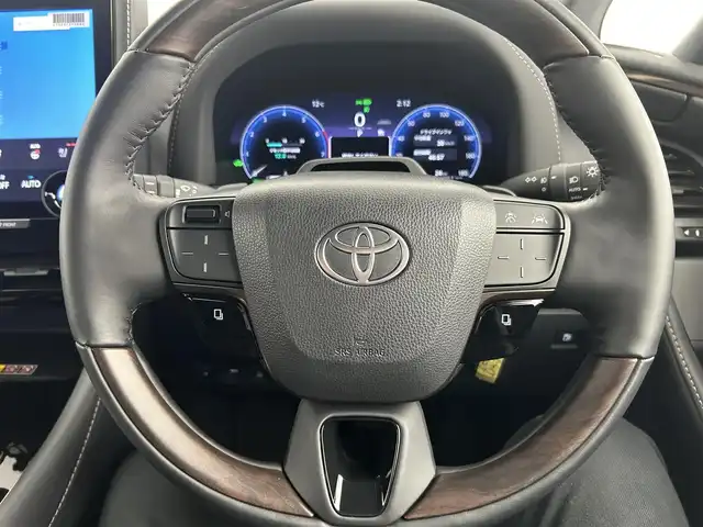 トヨタ ヴェルファイア ハイブリット Z プレミア 千葉県 2024(令6)年 0.5万km プラチナホワイトパールマイカ 禁煙車/ワンオーナー/トヨタセーフティセンス/・プリクラッシュセーフティ/・プリクラッシュセーフティブレーキ/・クリアランスソナー/・レーンディパーチャーアラート/・ブラインドスポットモニター/・ヘッドアップディスプレイ/・レーダークルーズコントロール/左右独立ツインガラスルーフ/純正１３型フリップダウンモニター/両側パワースライドドア/パワーバックドア/純正14インチディスプレイオーディオナビ（あり）/・USB/Bluetooth/フルセグTV/・全方位カメラ/・ビルトインETC2.0/革巻きステアリング/・ステアリングスイッチ/・ステアリングヒーター/・パドルシフト/レザーシート/・DNセカンドパワーシート/・D席メモリ付き/・DNセカンドシートヒーター/・DNセカンドエアーシート/置くだけ充電/AC100電源/社外フロアマット/純正１９インチAW/オートライト/・オートマチックハイビーム/・三眼LEDヘッドライト/・LEDフォグランプ