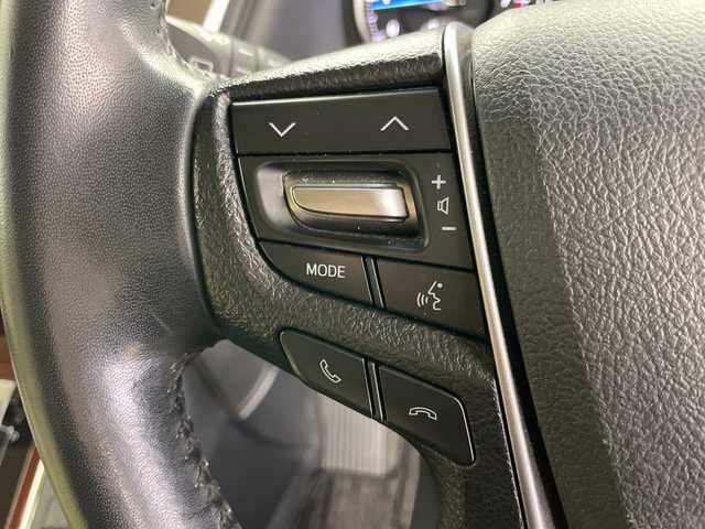 トヨタ ヴェルファイア V 道央・札幌 2015(平27)年 5.2万km バーニングブラッククリスタルシャインガラスフレーク ・4WD/・ワンオーナー/・純正ナビ/・BT&CD&DVD&SD＆フルセグTV/・バックカメラ/・純正フリップダウンモニター/・両側パワースライドドア/・助手席ロングスライド/・クルーズコントロール/・ハーフレザーシート/・D席メモリ付パワーシート/・ビルトインETC/・TVキャンセラー/・オットマン/・ステアリングスイッチ/・オートライト/・LEDヘッドライト/・プッシュスタート/・スマートキー/・スペアキー×1