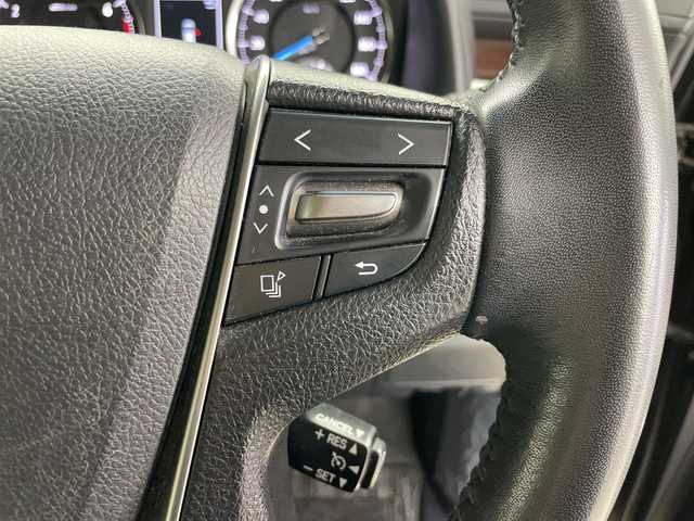 トヨタ ヴェルファイア V 道央・札幌 2015(平27)年 5.2万km バーニングブラッククリスタルシャインガラスフレーク ・4WD/・ワンオーナー/・純正ナビ/・BT&CD&DVD&SD＆フルセグTV/・バックカメラ/・純正フリップダウンモニター/・両側パワースライドドア/・助手席ロングスライド/・クルーズコントロール/・ハーフレザーシート/・D席メモリ付パワーシート/・ビルトインETC/・TVキャンセラー/・オットマン/・ステアリングスイッチ/・オートライト/・LEDヘッドライト/・プッシュスタート/・スマートキー/・スペアキー×1