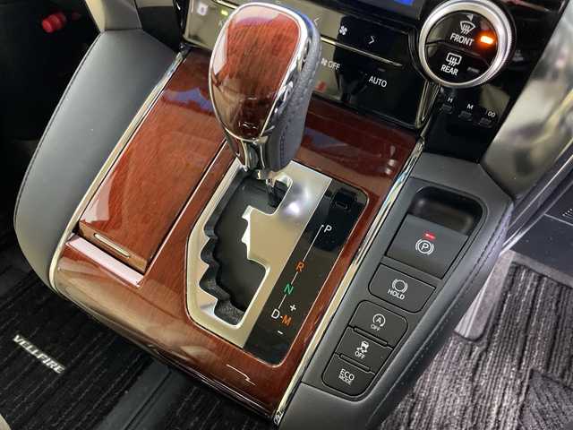 トヨタ ヴェルファイア V 道央・札幌 2015(平27)年 5.2万km バーニングブラッククリスタルシャインガラスフレーク ・4WD/・ワンオーナー/・純正ナビ/・BT&CD&DVD&SD＆フルセグTV/・バックカメラ/・純正フリップダウンモニター/・両側パワースライドドア/・助手席ロングスライド/・クルーズコントロール/・ハーフレザーシート/・D席メモリ付パワーシート/・ビルトインETC/・TVキャンセラー/・オットマン/・ステアリングスイッチ/・オートライト/・LEDヘッドライト/・プッシュスタート/・スマートキー/・スペアキー×1