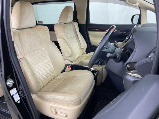 トヨタ ヴェルファイア V 道央・札幌 2015(平27)年 5.2万km バーニングブラッククリスタルシャインガラスフレーク ・4WD/・ワンオーナー/・純正ナビ/・BT&CD&DVD&SD＆フルセグTV/・バックカメラ/・純正フリップダウンモニター/・両側パワースライドドア/・助手席ロングスライド/・クルーズコントロール/・ハーフレザーシート/・D席メモリ付パワーシート/・ビルトインETC/・TVキャンセラー/・オットマン/・ステアリングスイッチ/・オートライト/・LEDヘッドライト/・プッシュスタート/・スマートキー/・スペアキー×1