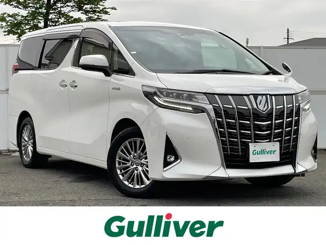 トヨタ アルファードハイブリット G Fパッケージ 岩手県 2019(令1)年 6.3万km ホワイトパールクリスタルシャイン 4WD/セーフティーセンス/　・プリクラッシュセーフティ/　・レーンディパーチャーアラート/　・ダプティブハイビームシステム/　・レーダークルーズコントロール/　・オートマチックハイビーム/フリップダウンモニター/社外メモリナビ/　CD/DVD/BT/フルセグTV/バックカメラ/両側パワースライドドア/パワーバックドア/LEDオートライト/革シート/パワーシート/シートヒーター/純正17インチアルミホイール/スマートキー/ビルトインETC
