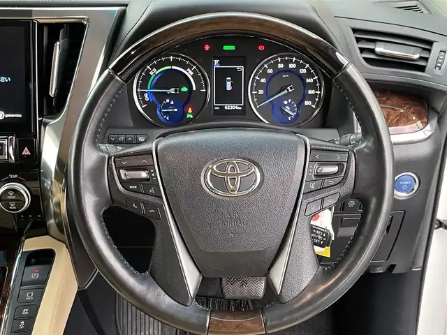 トヨタ アルファードハイブリット G Fパッケージ 岩手県 2019(令1)年 6.3万km ホワイトパールクリスタルシャイン 4WD/セーフティーセンス/　・プリクラッシュセーフティ/　・レーンディパーチャーアラート/　・ダプティブハイビームシステム/　・レーダークルーズコントロール/　・オートマチックハイビーム/フリップダウンモニター/社外メモリナビ/　CD/DVD/BT/フルセグTV/バックカメラ/両側パワースライドドア/パワーバックドア/LEDオートライト/革シート/パワーシート/シートヒーター/純正17インチアルミホイール/スマートキー/ビルトインETC
