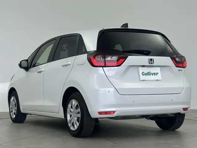 ホンダ フィット e:HEVホーム 愛知県 2023(令5)年 4.6万km プラチナホワイトパール 社外ナビ/（Bluetooth/CD） /レーダークルーズコントロール　/バックモニター　/コーナーセンサー　/衝突軽減システム　/レーンキープアシスト　/ハーフレザーシート　/オートライト　/電動格納ミラー　/ドライブレコーダー/ETC　/純正ホイールキャップ