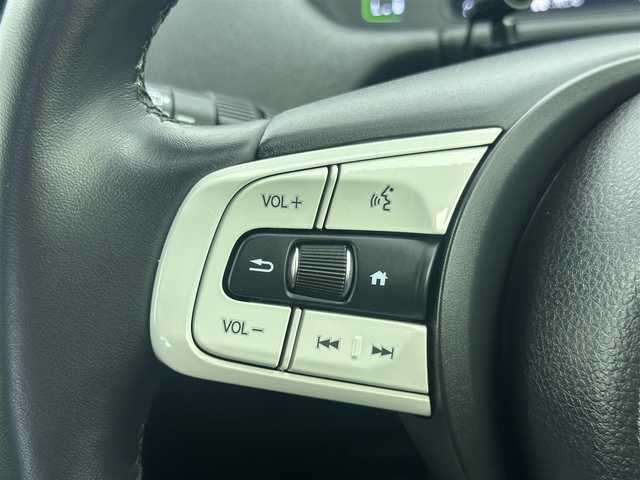 ホンダ フィット e:HEVホーム 愛知県 2023(令5)年 4.6万km プラチナホワイトパール 社外ナビ/（Bluetooth/CD） /レーダークルーズコントロール　/バックモニター　/コーナーセンサー　/衝突軽減システム　/レーンキープアシスト　/ハーフレザーシート　/オートライト　/電動格納ミラー　/ドライブレコーダー/ETC　/純正ホイールキャップ