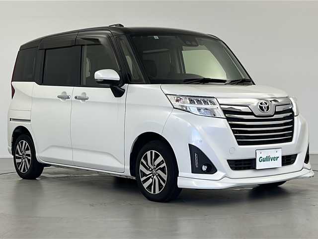 トヨタ ルーミー カスタムG 岐阜県 2019(令1)年 5.7万km ブラックマイカメタリック/パールホワイト2トーン トヨタディーラーオプションナビ/フリップダウンモニター/バックカメラ/Bluetooth接続/フルセグTV/両側パワースライドドア/横滑り防止装置/衝突軽減ブレーキ/アイドリングストップ/オートライト/オートハイビーム/電格ミラー/ステアリングリモコン/プッシュスタート/スマートキー/スペアキー（1本）/純正アルミホイール/純正フロアマット/純正ドアバイザー/ETC