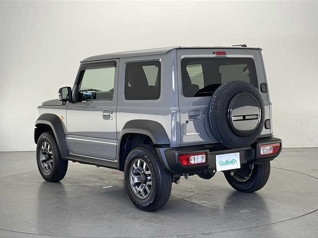 スズキ ジムニー シエラ JC 長野県 2023(令5)年 1.5万km ミディアムグレー 4WD/社外8インチナビ/（フルセグ/Bluetooth/CD/DVD)/ETC/衝突軽減ブレーキ/車線逸脱防止機能/クルーズコントロール/革調シートカバー/前席シートヒーター/2WD/4WD切り替え/ダウンヒルアシストコントロール/LEDヘッドライト/オートライト/SUZUKIグリル/ドアバイザー/ステアリングスイッチ/スマートキー
