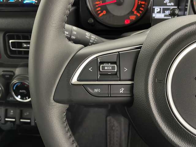 スズキ ジムニー シエラ JC 長野県 2023(令5)年 1.5万km ミディアムグレー 4WD/社外8インチナビ/（フルセグ/Bluetooth/CD/DVD)/ETC/衝突軽減ブレーキ/車線逸脱防止機能/クルーズコントロール/革調シートカバー/前席シートヒーター/2WD/4WD切り替え/ダウンヒルアシストコントロール/LEDヘッドライト/オートライト/SUZUKIグリル/ドアバイザー/ステアリングスイッチ/スマートキー