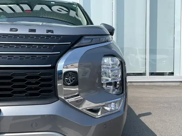 三菱 アウトランダー ＰＨＥＶ G 神奈川県 2023(令5)年 1.3万km チタニウムグレーメタリック ワンオーナー　/純正メモリナビ　BT/AppleCarPlay/AndoroidAuto/USB typeC/全周囲モニター　/パドルシフト　/AC1500W電源　/ワイヤレス充電　/レーダークルーズコントロール　/ステアリングヒーター/ヒートシーター　/パワーシート/ハーフレザーシート/前後コーナーセンサー　/クリアランスソナー　/ETC2.0　/電動格納ミラー/純正フロアマット/純正AW/ABS/横滑り防止装置/盗難防止装置/LEDヘッド/フォグランプ
