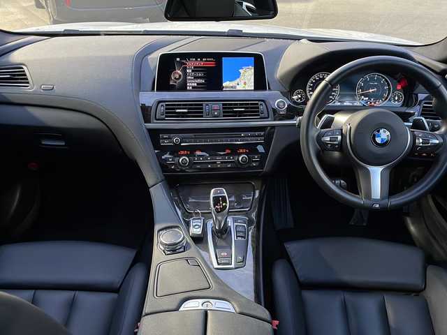 ＢＭＷ ６５０ｉ クーペ Mスポーツ 山口県 2016(平28)年 0.9万km アルピンホワイトⅢ Ｈａｒｍａｎ　Ｋａｒｄｏｎ　/サンルーフ　/黒革レザーシート/純正ナビ　/AM/FMBluetooth/CD/DVD/AUX/フルセグTV/バックカメラ　/ターボ　/ヘッドアップディスプレイ　/クリアランスソナー　/ＬＥＤヘッドライト　/オートライト、オートマチックハイビーム/純正20インチアルミホイール　/オートクルーズコントロール/前後型ドライブレコーダー/衝突被害軽減ブレーキ/プッシュスタート/WAC/社外フロアマット/取扱説明書