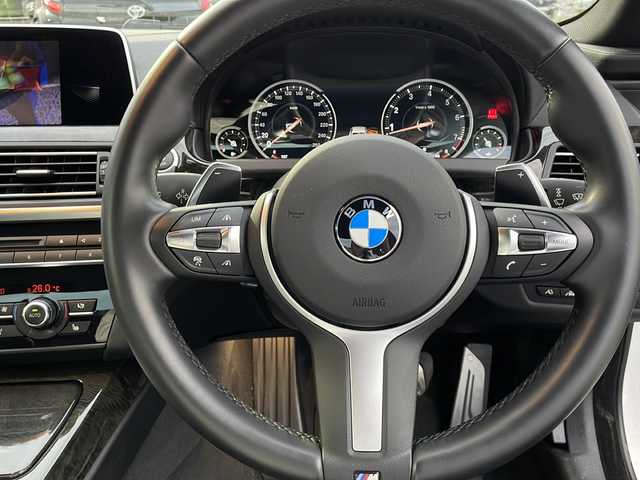 ＢＭＷ ６５０ｉ クーペ Mスポーツ 山口県 2016(平28)年 0.9万km アルピンホワイトⅢ Ｈａｒｍａｎ　Ｋａｒｄｏｎ　/サンルーフ　/黒革レザーシート/純正ナビ　/AM/FMBluetooth/CD/DVD/AUX/フルセグTV/バックカメラ　/ターボ　/ヘッドアップディスプレイ　/クリアランスソナー　/ＬＥＤヘッドライト　/オートライト、オートマチックハイビーム/純正20インチアルミホイール　/オートクルーズコントロール/前後型ドライブレコーダー/衝突被害軽減ブレーキ/プッシュスタート/WAC/社外フロアマット/取扱説明書
