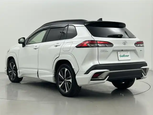 トヨタ カローラ クロス ハイブリッド Z 熊本県 2024(令6)年 1.1万km アティチュードブラックマイカ/プラチナホワイトパールマイカ ワンオーナー　/禁煙車　/モデリスタエアロフル　/１０．５インチディスプレイオーディオ（ＡｐｐｌＣａｒＰｌａｙ・ＡｎｄｒｏｉｄＡｕｔｏ・ＢＴ・フルセグ）/アラウンドビューモニター/社外前後ドライブレコーダー/トヨタセーフティーセンス/・プリクラッシュセーフティ/・レーンディパーチャーアラート/・ブラインドスポットモニター/・リアクロストラフィックアラート/・駐車時支援パーキングサポートシステム/・ロードサインアシスト/・レ前席シートヒーター/・レーーダークルーズコントロール/横滑り防止/前席シートヒーター/運転席パワーシート/ハーフレザーシート/デジタルインナーミラー/ルーフレール/純正フロアマット/純正１８インチAW/オートライト/オートマチックハイビーム/LEDヘッドライト/フォグライト/スマートキー/プッシュスタート/スペアキー1本/保証書/取扱説明書