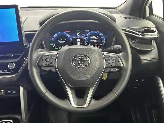 トヨタ カローラ クロス ハイブリッド Z 熊本県 2024(令6)年 1.1万km アティチュードブラックマイカ/プラチナホワイトパールマイカ ワンオーナー　/禁煙車　/モデリスタエアロフル　/１０．５インチディスプレイオーディオ（ＡｐｐｌＣａｒＰｌａｙ・ＡｎｄｒｏｉｄＡｕｔｏ・ＢＴ・フルセグ）/アラウンドビューモニター/社外前後ドライブレコーダー/トヨタセーフティーセンス/・プリクラッシュセーフティ/・レーンディパーチャーアラート/・ブラインドスポットモニター/・リアクロストラフィックアラート/・駐車時支援パーキングサポートシステム/・ロードサインアシスト/・レ前席シートヒーター/・レーーダークルーズコントロール/横滑り防止/前席シートヒーター/運転席パワーシート/ハーフレザーシート/デジタルインナーミラー/ルーフレール/純正フロアマット/純正１８インチAW/オートライト/オートマチックハイビーム/LEDヘッドライト/フォグライト/スマートキー/プッシュスタート/スペアキー1本/保証書/取扱説明書