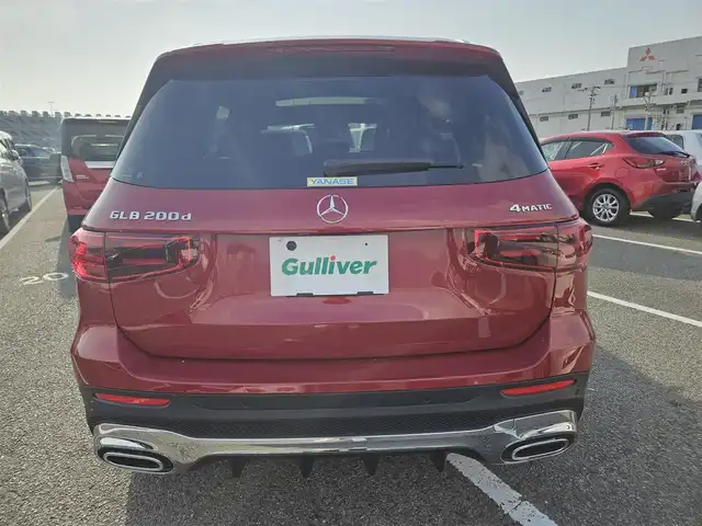 メルセデス・ベンツ Ｍ・ベンツ ＧＬＢ２００ｄ 4マチック AMGライン 愛知県 2024(令6)年 1.1万km 赤 4WD/アドバンスドパッケージ/パノラミックスライディングルーフ/ブルメスターサラウンドサウンドシステム/純正10.25型ナビ/パワーテールゲート/360°カメラシステム/ビルトインETC/レーダーセーフティパッケージ/・アダプティブディスタンスアシストディストロニック/・アクティブステアリングアシスト/・自動再発進機能/・降車時警告機能　他/マルチビームLEDヘッドランプ/アダプティブハイビームアシストプラス/ナッパ革巻きフラットボトムステアリング/パドルシフト/合皮/スエード調シート/前席スポーツシート/前席シートヒーター/純正20インチアルミホイール/キーレスゴー/禁煙車