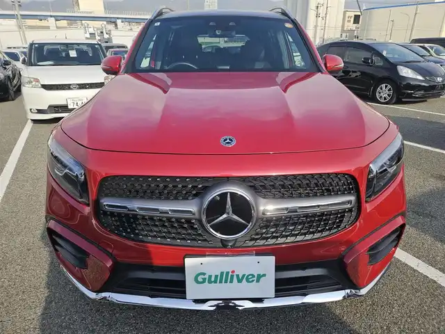メルセデス・ベンツ Ｍ・ベンツ ＧＬＢ２００ｄ 4マチック AMGライン 愛知県 2024(令6)年 1.1万km 赤 4WD/アドバンスドパッケージ/パノラミックスライディングルーフ/ブルメスターサラウンドサウンドシステム/純正10.25型ナビ/パワーテールゲート/360°カメラシステム/ビルトインETC/レーダーセーフティパッケージ/・アダプティブディスタンスアシストディストロニック/・アクティブステアリングアシスト/・自動再発進機能/・降車時警告機能　他/マルチビームLEDヘッドランプ/アダプティブハイビームアシストプラス/ナッパ革巻きフラットボトムステアリング/パドルシフト/合皮/スエード調シート/前席スポーツシート/前席シートヒーター/純正20インチアルミホイール/キーレスゴー/禁煙車