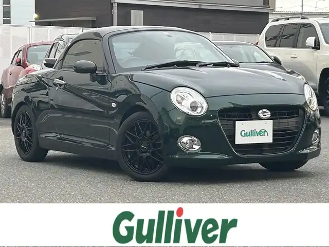 ダイハツ コペン セロ 福岡県 2016(平28)年 8.1万km ブリティッシュグリーンマイカ ワンオーナー/純正ナビ（AM/FM/BT/CD/DVD/フルセグTV）/純正フロアマット/社外１５インチアルミホイール（humanline）/全席シートヒーター/横滑り防止装置/LEDヘッドライト/バックカメラ/ETC/ステアリングスイッチ/オートエアコン/プッシュスタート/パワーステアリング/パワーウインドウ/スマートキー/スペアキー×１/取扱説明書/保証書/記録簿