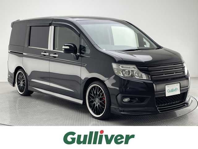 ホンダ ステップワゴン スパーダ Z クールスピリット 兵庫県 2013(平25)年 6.1万km プレミアムスパークルブラックパール 純正9インチナビ(フルセグ/CD/DVD/Bluetooth)/フリップダウンモニター/社外エアサス/社外ウーファー/社外エアロ/社外ステアリング/社外アルミホイール/社外マフラー/LEDヘッドライト/社外LEDフォグランプ/ビルトインETC/両側パワースライドドア/パドルシフト/アイドリングストップ/社外テールライト