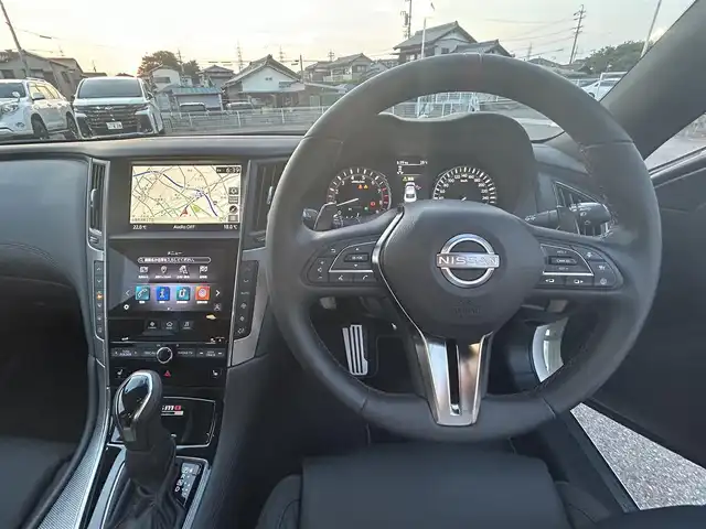 日産 スカイライン ニスモ 愛知県 2023(令5)年 0.6万km 白 ワンオーナー/1000台限定車/純正メモリーナビ/BOSEサウンド/全周囲アラウンドビューモニター/DTV、ETC2.0/電動ガラスサンルーフ/NISMO専用オプション