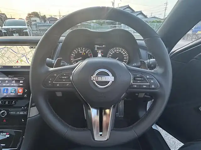 日産 スカイライン ニスモ 愛知県 2023(令5)年 0.6万km 白 ワンオーナー/1000台限定車/純正メモリーナビ/BOSEサウンド/全周囲アラウンドビューモニター/DTV、ETC2.0/電動ガラスサンルーフ/NISMO専用オプション