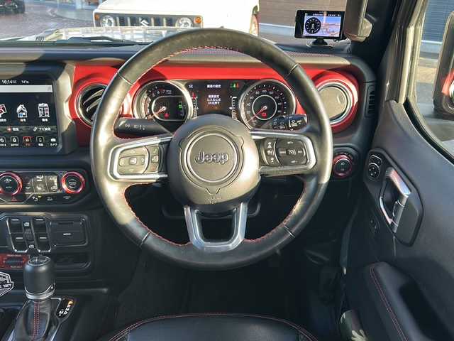 クライスラー・ジープ ジープ ラングラー アンリミテッド ルビコン 佐賀県 2021(令3)年 1.6万km グレー 3インチリフトアップ/社外２０インチAW/社外2本出しマフラー/純正8.4インチナビ/(フルセグTV Bluetooth USB AUX)/バック/サイドカメラ/衝突被害軽減システム/レーダークルーズコントロール/ブラインドスポット/ブラックレザーシート/シートヒーター/ステアリングヒーター/ETC2.0/LEDヘッドライト/フォグランプ/オートライト/ウィンカーミラー/プッシュスタート/スマートキー×２/フロアマット/横滑り防止装置/取説・保証書/純正マフラー、純正17インチAW5本、積み込み/色コード：PDN スティンググレークリアコート