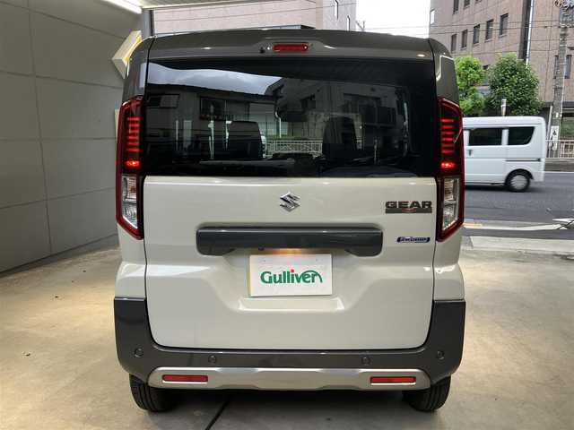 スズキ スペーシア ギア HYBRID XZターボ 東京都 2024(令6)年 0.6万km ベージュ ワンオーナー/セーフティサポート/・デュアルセンサーブレーキサポート2/・誤発進抑制機能（前後）/・低速時ブレーキサポート（前後）/・車線逸脱警告機能/・車線維持支援機能/・ふらつき警告機能/・発進お知らせ機能/・ハイビームアシスト/・アダクティブクルーズコントロール/・標識認識機能/9インチメモリーナビ/アランドビューモニター/ハンドルヒーター/シートヒーター/パドルシフト/Apple CarPlay /AndroidAuto/USBソケット/Bluetooth /フルセグテレビ/LEDヘッドライト・フォグランプ/保証書・取扱説明書