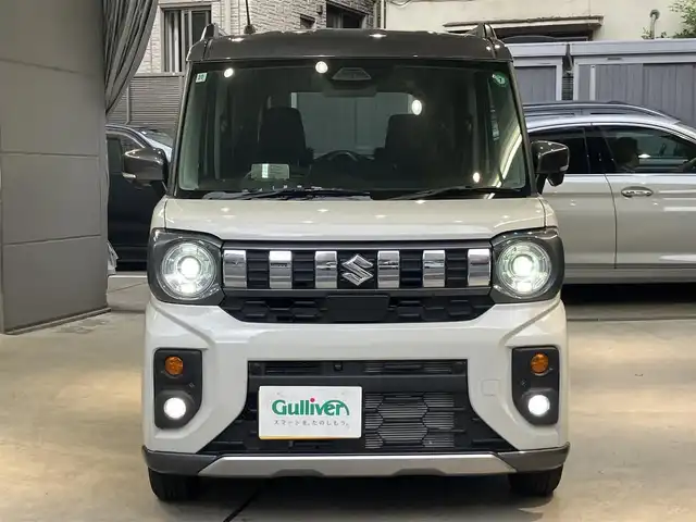 スズキ スペーシア ギア HYBRID XZターボ 東京都 2024(令6)年 0.6万km ベージュ ワンオーナー/セーフティサポート/・デュアルセンサーブレーキサポート2/・誤発進抑制機能（前後）/・低速時ブレーキサポート（前後）/・車線逸脱警告機能/・車線維持支援機能/・ふらつき警告機能/・発進お知らせ機能/・ハイビームアシスト/・アダクティブクルーズコントロール/・標識認識機能/9インチメモリーナビ/アランドビューモニター/ハンドルヒーター/シートヒーター/パドルシフト/Apple CarPlay /AndroidAuto/USBソケット/Bluetooth /フルセグテレビ/LEDヘッドライト・フォグランプ/保証書・取扱説明書