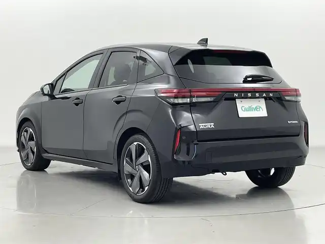日産 オーラ G 熊本県 2023(令5)年 1.4万km 黒 社外前方ドライブレコーダー　/社外ナビAVN-LBS01　/バックカメラ　/ＥＴＣ　/前後クリアランスソナー　/エマージェンシーブレーキ　/標識認識機能　/レーンキープアシスト/レーンデェパーチャアラート/ブラインドスポットモニター　/ふらつき警報機能/インテリジェントルームミラー/社外フロアマット/純正１７インチAW/オートライト/オートマチックハイビーム/LEDヘッドライト/フォグライト/スマートキー/プッシュスタート/保証書/取扱説明書
