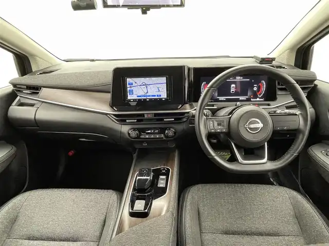 日産 オーラ G 熊本県 2023(令5)年 1.4万km 黒 社外前方ドライブレコーダー　/社外ナビAVN-LBS01　/バックカメラ　/ＥＴＣ　/前後クリアランスソナー　/エマージェンシーブレーキ　/標識認識機能　/レーンキープアシスト/レーンデェパーチャアラート/ブラインドスポットモニター　/ふらつき警報機能/インテリジェントルームミラー/社外フロアマット/純正１７インチAW/オートライト/オートマチックハイビーム/LEDヘッドライト/フォグライト/スマートキー/プッシュスタート/保証書/取扱説明書
