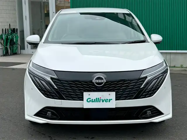日産 オーラ G レザーエディション 宮城県 2024(令6)年 3.5万km ピュアホワイトパール コネクトナビゲーションシステム/・メモリーナビ/・9インチワイドディスプレイ/・地デジTV/・BOSEパーソナルプラスサウンドシステム/・USB電源ソケットタイプA（前席）/・ワイヤレス充電/・ETC2.0/・プロパイロット/・SOSコール/＝＝＝/インテリジェントエマージェンシーブレーキ/踏み間違い衝突防止アシスト/標識検知機能/前方衝突予測警報/車線逸脱警報/ふらつき警報/車線逸脱防止支援システム/エマージェンシーストップシグナル/後側方衝突防止支援システム/後側方車両検知警報/後退時車両検知機能/コーナーセンサー/インテリジェントルームミラー/インテリジェントアラウンドビューモニター/レザーシート（グレー）/運転席パワーシート/革巻きステアリング/ステアリングスイッチ/電動パーキングブレーキ/ブレーキホールド/アダプティブLEDヘッドランプ/フォグランプ/オートライト/スマートキー＆プッシュスタート/電動格納ミラー/純正17インチAW/W/サイド/カーテンエアバッグ