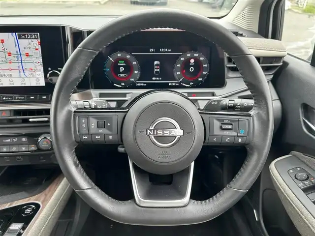 日産 オーラ G レザーエディション 宮城県 2024(令6)年 3.5万km ピュアホワイトパール コネクトナビゲーションシステム/・メモリーナビ/・9インチワイドディスプレイ/・地デジTV/・BOSEパーソナルプラスサウンドシステム/・USB電源ソケットタイプA（前席）/・ワイヤレス充電/・ETC2.0/・プロパイロット/・SOSコール/＝＝＝/インテリジェントエマージェンシーブレーキ/踏み間違い衝突防止アシスト/標識検知機能/前方衝突予測警報/車線逸脱警報/ふらつき警報/車線逸脱防止支援システム/エマージェンシーストップシグナル/後側方衝突防止支援システム/後側方車両検知警報/後退時車両検知機能/コーナーセンサー/インテリジェントルームミラー/インテリジェントアラウンドビューモニター/レザーシート（グレー）/運転席パワーシート/革巻きステアリング/ステアリングスイッチ/電動パーキングブレーキ/ブレーキホールド/アダプティブLEDヘッドランプ/フォグランプ/オートライト/スマートキー＆プッシュスタート/電動格納ミラー/純正17インチAW/W/サイド/カーテンエアバッグ