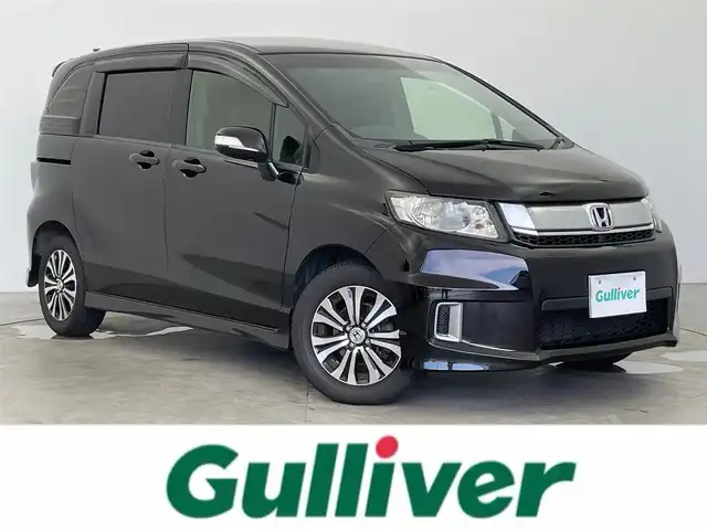 ホンダ フリード スパイク G エアロ 富山県 2014(平26)年 7.1万km プレミアムスパークルブラックパール 純正ナビ（CD DVD bluetooth）/フルセグTV/バックカメラ/ビルトインETC/15インチAW付きスタッドレスタイヤセット積込み/フロントガラス熱線/スマートキー/両側パワースライドドア/オートライト/純正マット、社外バイザー/保証書、取説/スペアキー