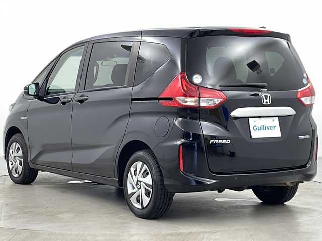 ホンダ フリード ハイブリット G ホンダセンシング 道央・札幌 2021(令3)年 5万km クリスタルブラックパール ・社外メモリナビ/　CD/BT/ワンセグTV/・バックカメラ/・両側パワースライドドア/・HONDA SENSING/　衝突軽減ブレーキ/　誤発進抑制(前後)/　事故低減ステアリング/　路外逸脱抑制/　アダプティブクルーズコントロール/　車線維持支援/　標識認識/　オートハイビーム/・前席シートヒーター/・オートリトラミラー/・ワイパーデアイサー /・オートライト/・LEDヘッドライト/・後席シェード/・純正フロアマット/・ビルトインETC