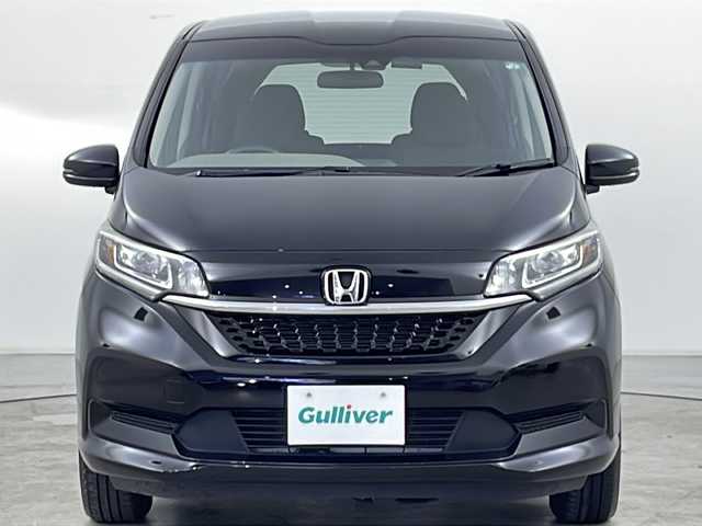ホンダ フリード ハイブリット G ホンダセンシング 道央・札幌 2021(令3)年 5万km クリスタルブラックパール ・社外メモリナビ/　CD/BT/ワンセグTV/・バックカメラ/・両側パワースライドドア/・HONDA SENSING/　衝突軽減ブレーキ/　誤発進抑制(前後)/　事故低減ステアリング/　路外逸脱抑制/　アダプティブクルーズコントロール/　車線維持支援/　標識認識/　オートハイビーム/・前席シートヒーター/・オートリトラミラー/・ワイパーデアイサー /・オートライト/・LEDヘッドライト/・後席シェード/・純正フロアマット/・ビルトインETC