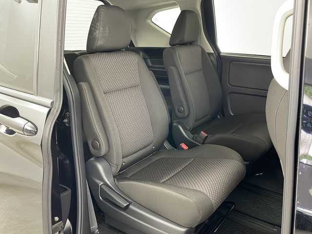 ホンダ フリード ハイブリット G ホンダセンシング 道央・札幌 2021(令3)年 5万km クリスタルブラックパール ・社外メモリナビ/　CD/BT/ワンセグTV/・バックカメラ/・両側パワースライドドア/・HONDA SENSING/　衝突軽減ブレーキ/　誤発進抑制(前後)/　事故低減ステアリング/　路外逸脱抑制/　アダプティブクルーズコントロール/　車線維持支援/　標識認識/　オートハイビーム/・前席シートヒーター/・オートリトラミラー/・ワイパーデアイサー /・オートライト/・LEDヘッドライト/・後席シェード/・純正フロアマット/・ビルトインETC