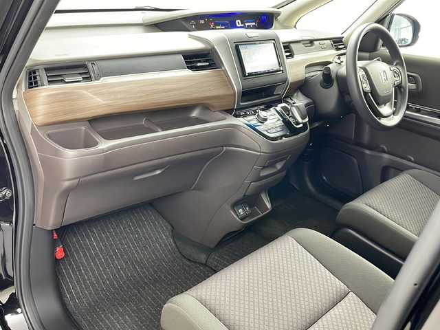 ホンダ フリード ハイブリット G ホンダセンシング 道央・札幌 2021(令3)年 5万km クリスタルブラックパール ・社外メモリナビ/　CD/BT/ワンセグTV/・バックカメラ/・両側パワースライドドア/・HONDA SENSING/　衝突軽減ブレーキ/　誤発進抑制(前後)/　事故低減ステアリング/　路外逸脱抑制/　アダプティブクルーズコントロール/　車線維持支援/　標識認識/　オートハイビーム/・前席シートヒーター/・オートリトラミラー/・ワイパーデアイサー /・オートライト/・LEDヘッドライト/・後席シェード/・純正フロアマット/・ビルトインETC