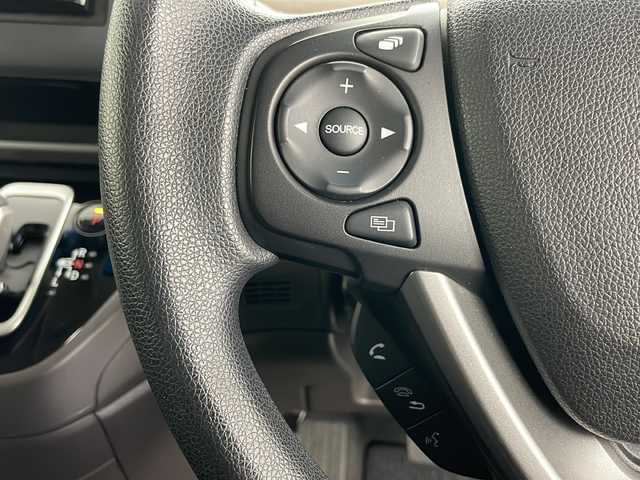 ホンダ フリード ハイブリット G ホンダセンシング 道央・札幌 2021(令3)年 5万km クリスタルブラックパール ・社外メモリナビ/　CD/BT/ワンセグTV/・バックカメラ/・両側パワースライドドア/・HONDA SENSING/　衝突軽減ブレーキ/　誤発進抑制(前後)/　事故低減ステアリング/　路外逸脱抑制/　アダプティブクルーズコントロール/　車線維持支援/　標識認識/　オートハイビーム/・前席シートヒーター/・オートリトラミラー/・ワイパーデアイサー /・オートライト/・LEDヘッドライト/・後席シェード/・純正フロアマット/・ビルトインETC