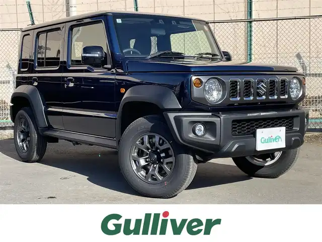 スズキ ジムニー ノマド FC 東京都 2025(令7)年 0.1千km 紺 登録済未使用車/4WD/スズキセーフティセンス/・衝突軽減装置/・車線逸脱警報装置/・横滑り防止装置/レーダークルーズコントロール/前席シートヒーター/オートライト/ヒルディセントコントロール/スマートキー/純正１５インチＡＷ/ＬＥＤヘッドライト