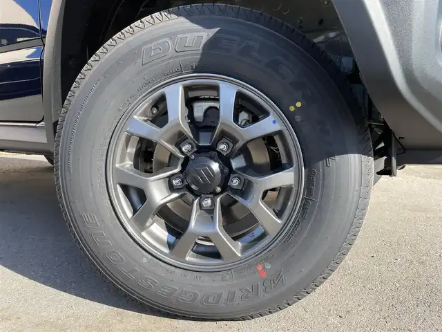 スズキ ジムニー ノマド FC 東京都 2025(令7)年 0.1千km 紺 登録済未使用車/4WD/スズキセーフティセンス/・衝突軽減装置/・車線逸脱警報装置/・横滑り防止装置/レーダークルーズコントロール/前席シートヒーター/オートライト/ヒルディセントコントロール/スマートキー/純正１５インチＡＷ/ＬＥＤヘッドライト