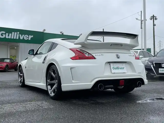 日産 フェアレディ Ｚ バージョンNISMO 千葉県 2012(平24)年 8.6万km ブリリアントホワイトパール TEIN車高調/FUJITUBO2本出しマフラー/ニスモ専用ハーフレザーシート/ニスモ専用19インチアルミホイール/インテリジェントキー/純正HDDナビ/・CD/DVD/MSV/Bluetooth/フルセグ/バックカメラ/社外カーボン調ステアリング/純正キセノンヘッドライト/パドルシフト/リアスポイラー/ビルトインETC/サイド＆カーテンエアバッグ/新車時保証書＆取扱説明書