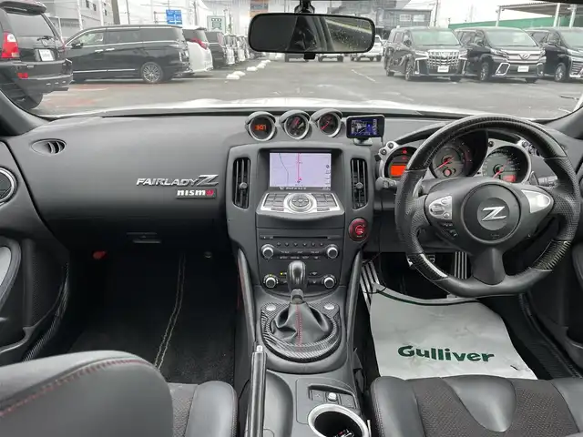 日産 フェアレディ Ｚ バージョンNISMO 千葉県 2012(平24)年 8.6万km ブリリアントホワイトパール TEIN車高調/FUJITUBO2本出しマフラー/ニスモ専用ハーフレザーシート/ニスモ専用19インチアルミホイール/インテリジェントキー/純正HDDナビ/・CD/DVD/MSV/Bluetooth/フルセグ/バックカメラ/社外カーボン調ステアリング/純正キセノンヘッドライト/パドルシフト/リアスポイラー/ビルトインETC/サイド＆カーテンエアバッグ/新車時保証書＆取扱説明書