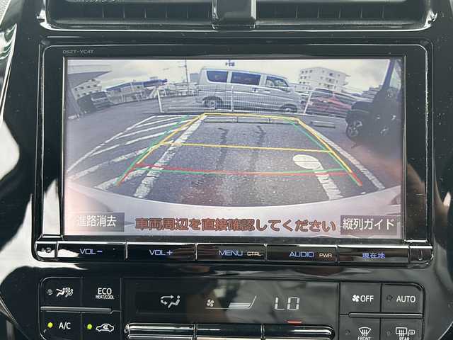 トヨタ プリウス A 沖縄県 2016(平28)年 5.6万km スティールブロンドM 禁煙車　/純正９インチ フルセグＴＶ Bluetooth DVD再生可/バックカメラ/トヨタセーフティセンス　/ビルトインＥＴＣ　/ＬＥＤヘッドライト　/オートライト　/オートハイビーム　/ブラインドスポットモニター　/ヘッドアップディスプレイ　/クリアランスソナー/スマートキー