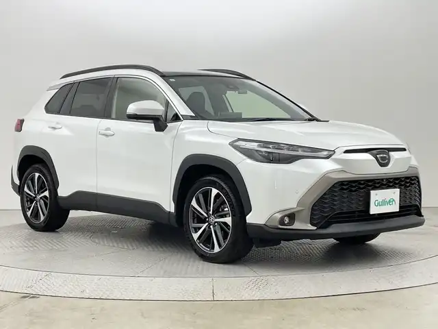 トヨタ カローラ クロス Z 新潟県 2021(令3)年 1.2万km プラチナホワイトパールマイカ ワンオーナー/衝突被害軽減ブレーキ/レーンキープアシスト/ブラインドスポットモニター/パノラマルーフ/純正ナビ/　（BT/USB/AM/FM）/全周囲カメラ/レーダークルーズコントロール/LEDオートライト/ハーフレザーシート/パワーシート/シートヒーター/純正18インチアルミホイール/ステアリングスイッチ/USBポート/スマートキー/ビルトインETC